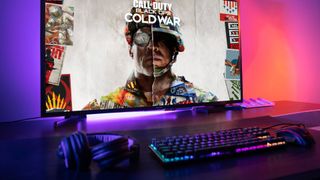 Call of Duty Cold War game on the PC with headset and keyboard visible