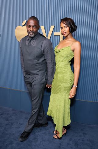 Sabrina Elba wears a green dress to the Emmys after-party.