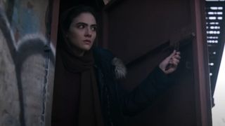 A close-up of Noor hiding during The Night Agent season 2