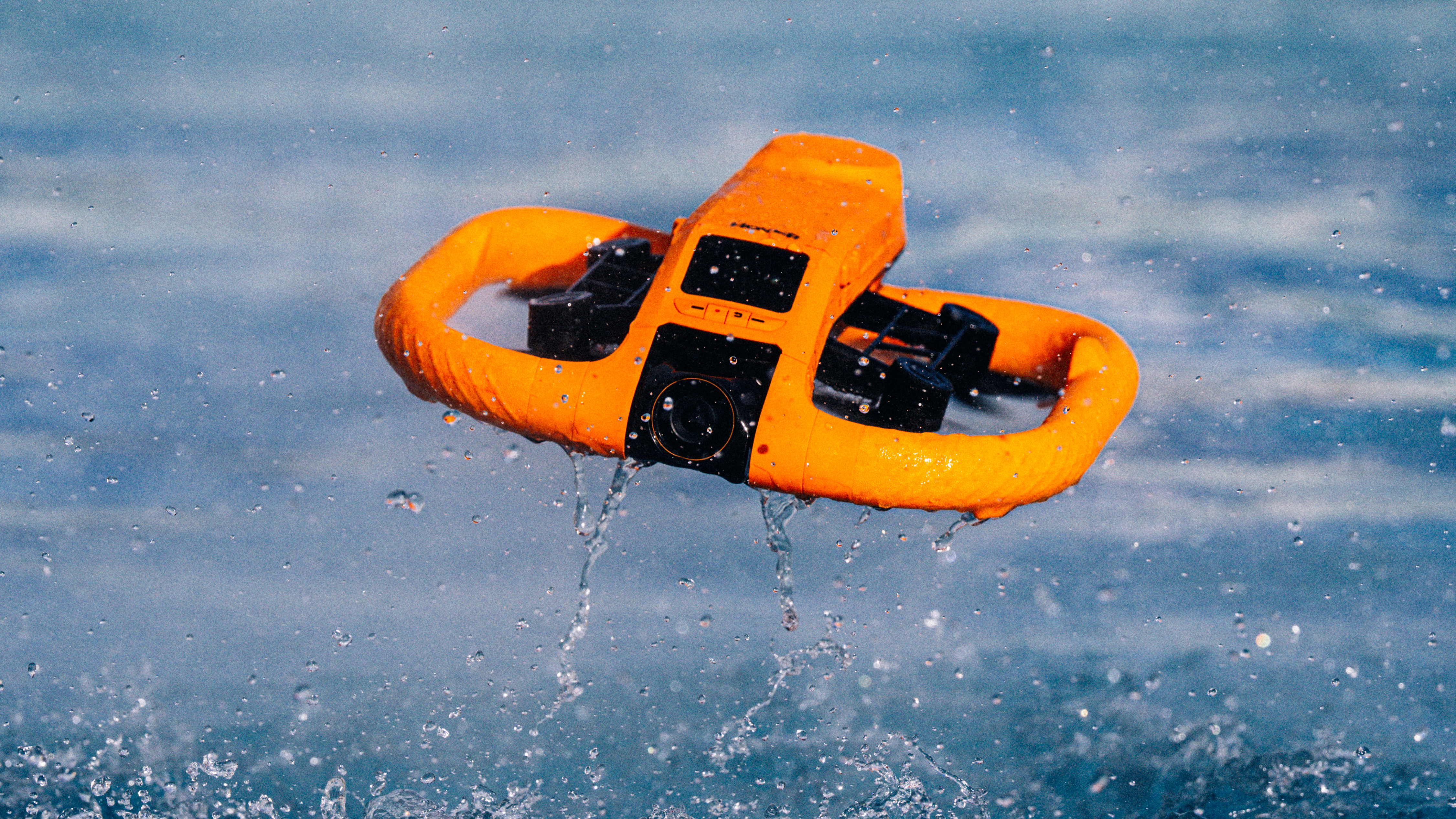 HoverAir Aqua drone over water