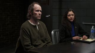 Patrick Carroll as George Brouchard and Marisa Brau-Reyes as Counselor Edwina Myerson in a interrogation room in Law & Order: SVU