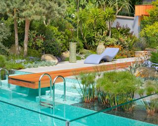 Contemporary garden design with a swimming pool in Mediterranean style