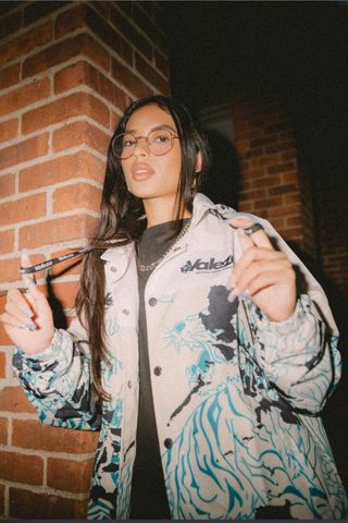 model wearing patterned jacket