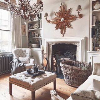 scandi living room with white armchair and wooden flooring