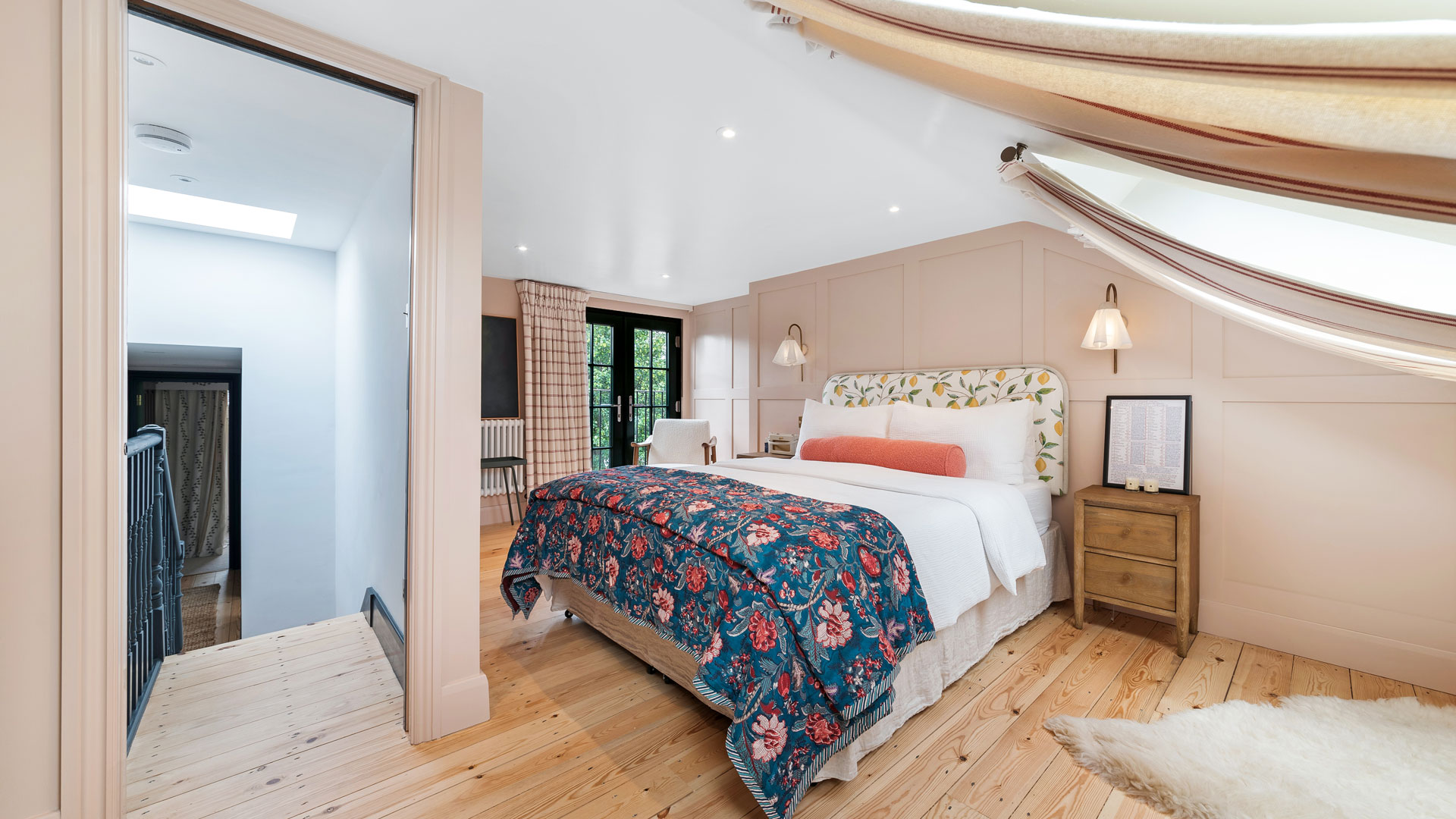 pink bedroom in loft conversion