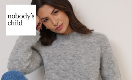 nobodys child logo top left with a woman in grey jumper