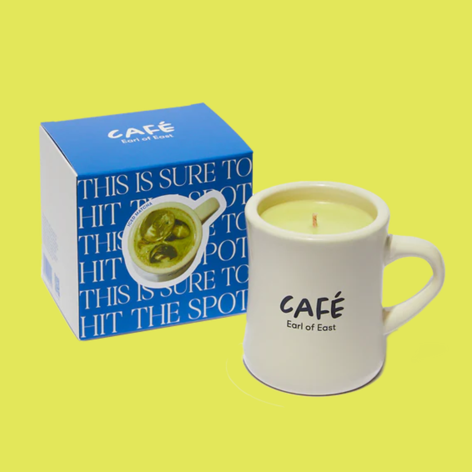 A matcha candle in a ceramic mug
