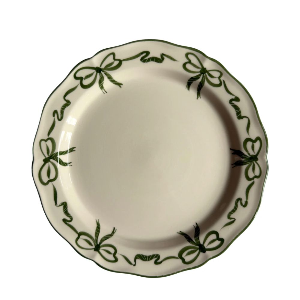 plate with green bow design around the edge
