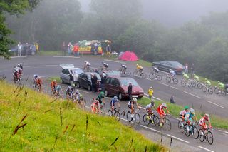 The breakaway is chased by the peloton as they make the climb of the Col de Mente during stage 17 of the 2012 Tour de France from Bagneres-de-Luchon to Peyragudes
