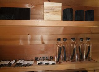 Display of products by Sort of Coal on 2 level wooden shelves