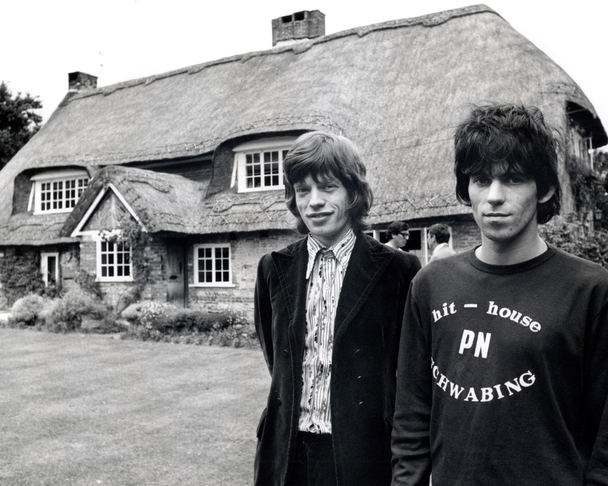 keith richards and mick jagger in front of his house in Sussex