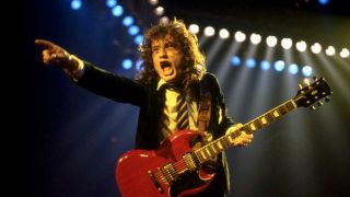 Angus Young onstage 