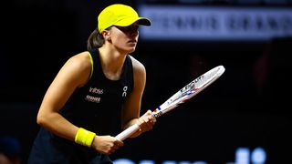 Iga Swiatek of Poland in action against Jana Fett of Croatia in the second round on Day 3 of the Porsche Tennis Grand Prix in April 2025