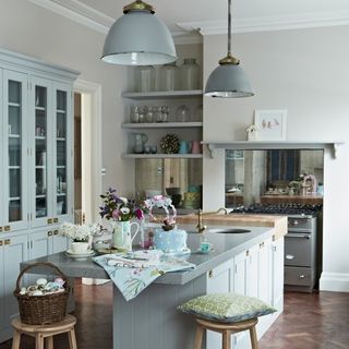 kitchen with pastel blue painted cabinetry