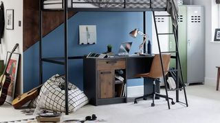 A loft be with a study desk underneath