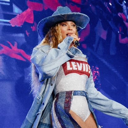Beyoncé takes center stage at the 'Cowboy Carter' concert in a custom denim Levi's look.