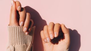 Nail trends 2023 - gold foil nude nails