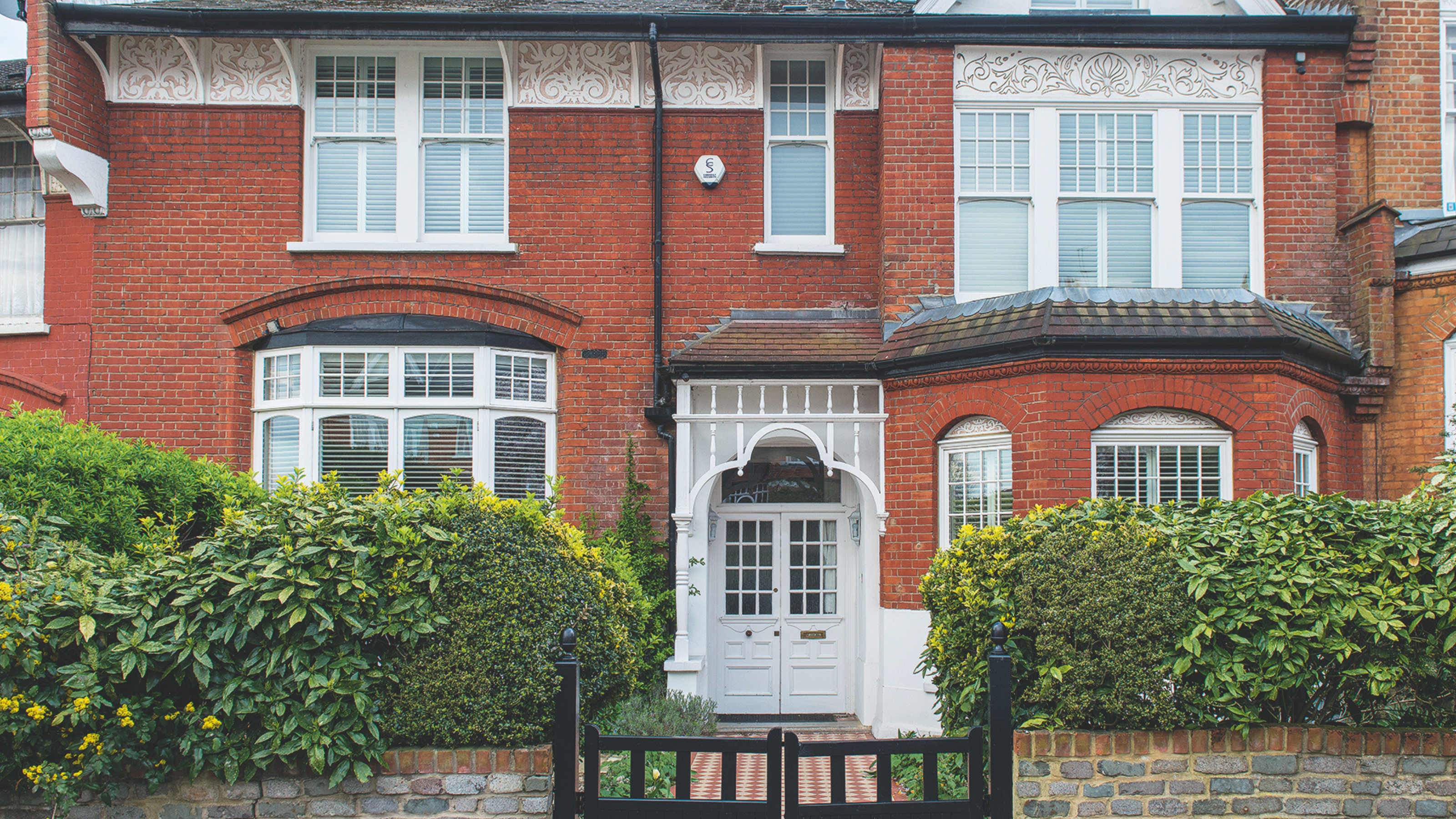  Exterior of the Edwardian terrace of the Muswell Hill house, garden gate and path to the front door.