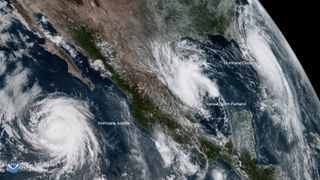 Hurricane Dorian, seen in this satellite view on Sept. 3, 2019, along with two other brewing storms.