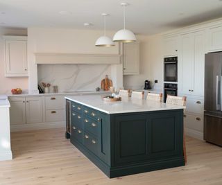 cream Shaker kitchen with central green kitchen island