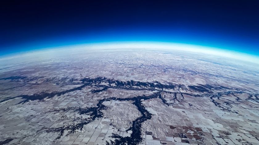 A view of Earth from space showing the planet&#039;s rounded horizon.