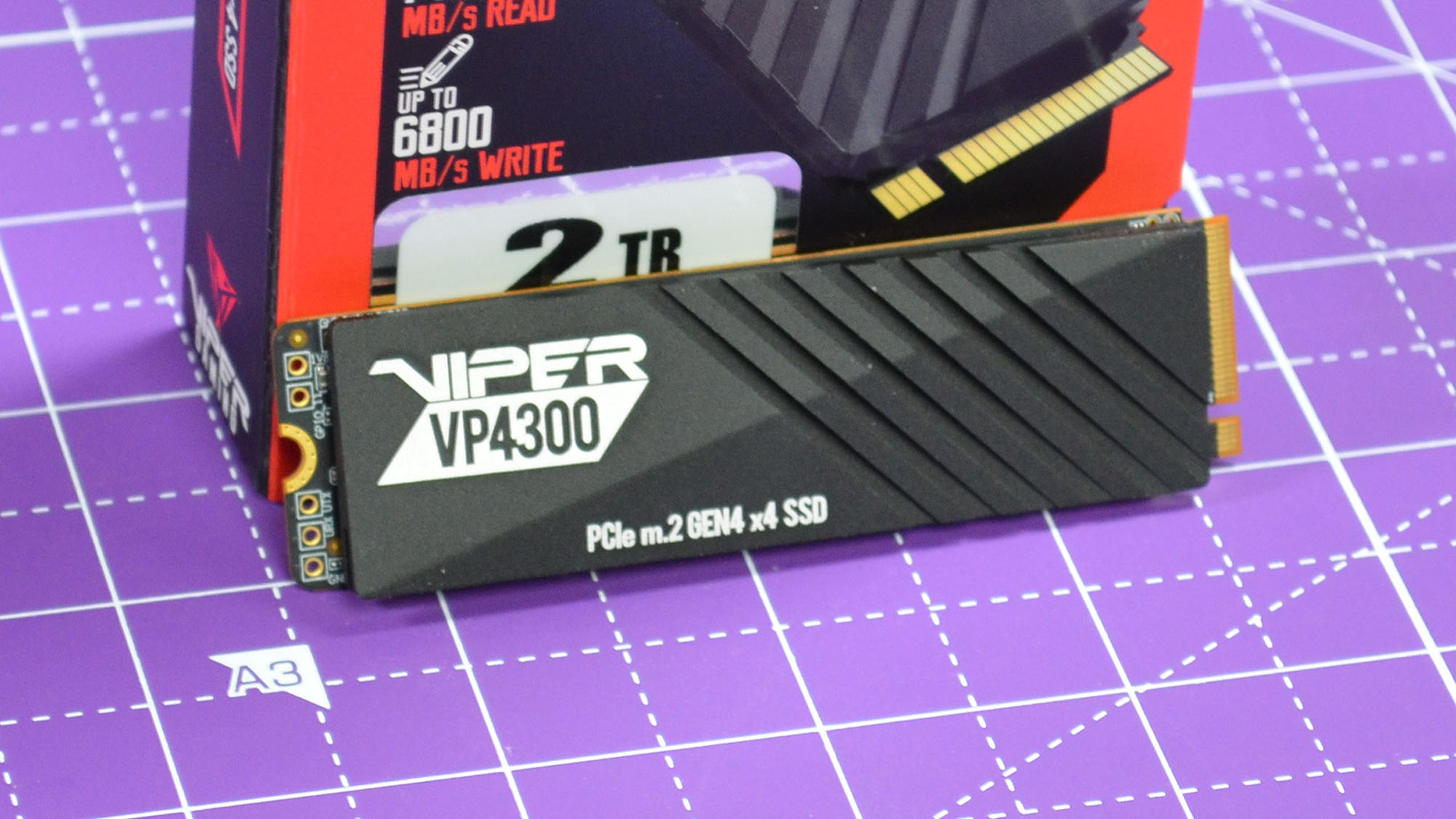 A Patriot Viper VP4300 on a purple desk mat
