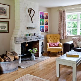 living room with wooden floor and yellow couch