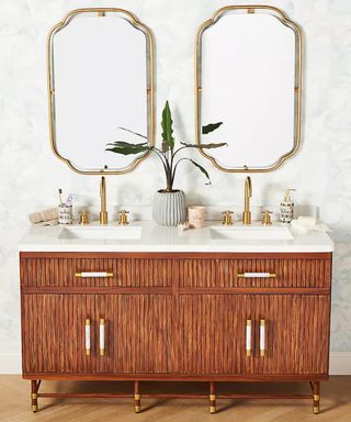 marble bathroom countertop with two parallel wall mirrors