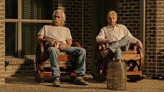 T.L. (Sam Elliott) and Tommy (Billy Bob Thornton) sitting side by side in Landman season 2