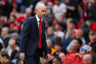 Manchester United boss Erik ten Hag looks on after his side's defeat against Liverpool