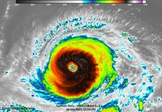 The Suomi NPP satellite used the VIIRIS instrument to capture this infrared image of Typhoon Noru, illustrating the extremely cold temperatures present in the topmost clouds making up the massive thunderstorms circling the eye.