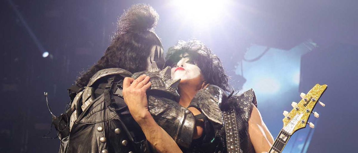 Gene Simmons and Paul Stanley embrace onstage at their final show