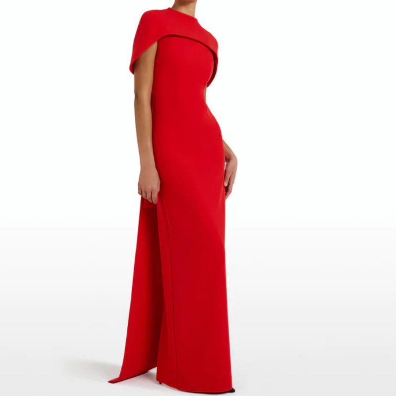 meghan red cape dress Meghan Markle Just Wore a Red Valentino Cape Dress For Her First Day in Morocco