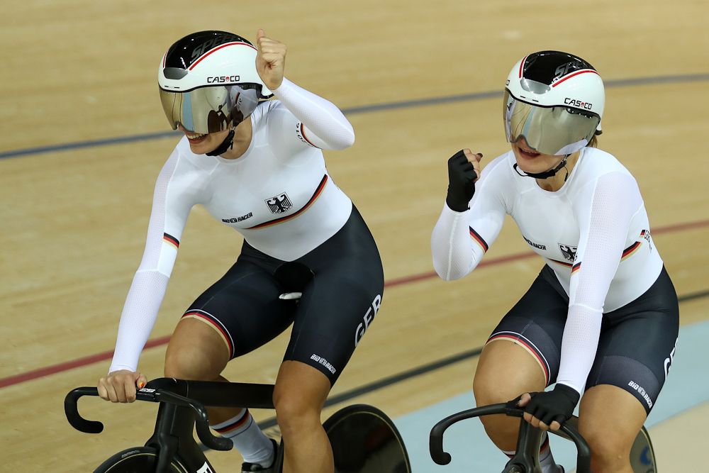 Miriam Welte and Kristina Vogel of Team Germany celebrates winning the bronze medal after the Women's Team Sprint