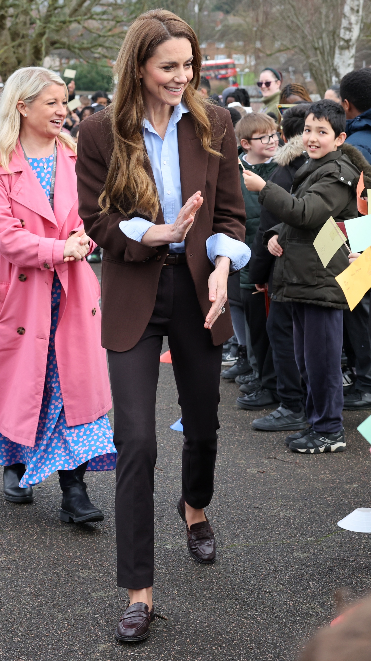 Catherine, Princess Of Wales waves as she arrives to visit Castle Hill Academy