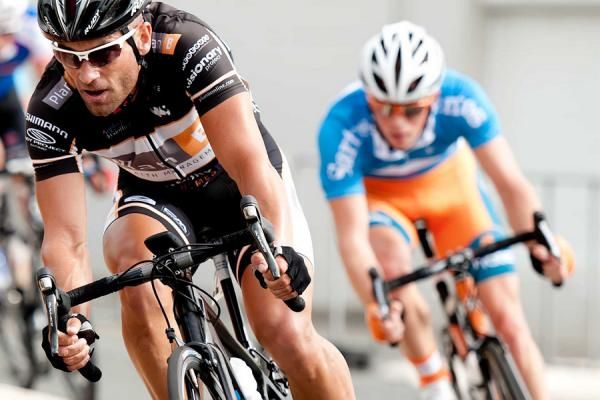 Pat Shaw lurks behind a Plan B rider.