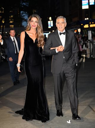 Amal Clooney and George Clooney wearing versace at the albies