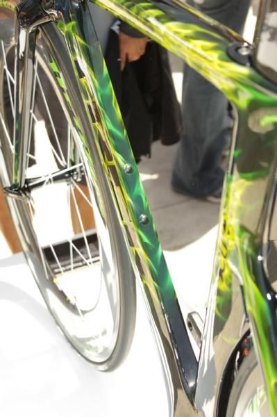 The brake and shifter cables exit the back of the stem into the top tube and are protected by a rubber cover.