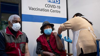 People getting an NHS Covid vaccine