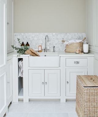 white utility room with large butler sink