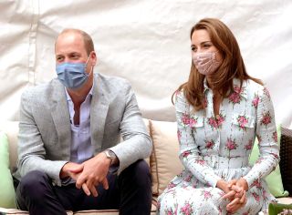 CARDIFF, WALES - AUGUST 05: Prince William, Duke of Cambridge and Catherine, Duchess of Cambridge meet residents at the Shire Hall Care Home, where they spoke to some of the home's staff, residents and their family members on August 5, 2020 in Cardiff, Wales. In May, The Duke and Duchess joined staff and residents from Shire Hall via video call, and took their turn as guest bingo callers for a game in the home's cinema. (Photo by Jonathan Buckmaster - WPA Pool/Getty Images)