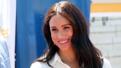 Meghan Markle, Duchess of Sussex visits a township with Prince Harry, Duke of Sussex to learn about Youth Employment Services on October 02, 2019 in Johannesburg, South Africa