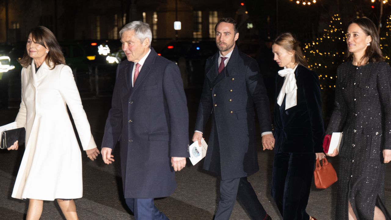 Carole Middleton wears a white coat and is joined by Pippa Middleton in a black sparkly coat and their family members for Kate Middleton&#039;s Christmas carol concert