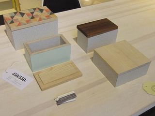 A collection of varying wooden storage boxes