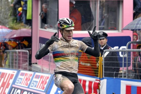 Evolution: Cadel Evans' introduced a second hand to his victory salute today