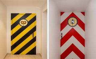 Always Close installation by Studio Job in Luxembourg. Two images. Left, a door with diagonal yellow and black lines on it. Right, a door with red and white arrows on it.