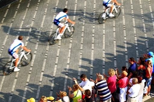 The fans cheer the riders on as they head to the stage.