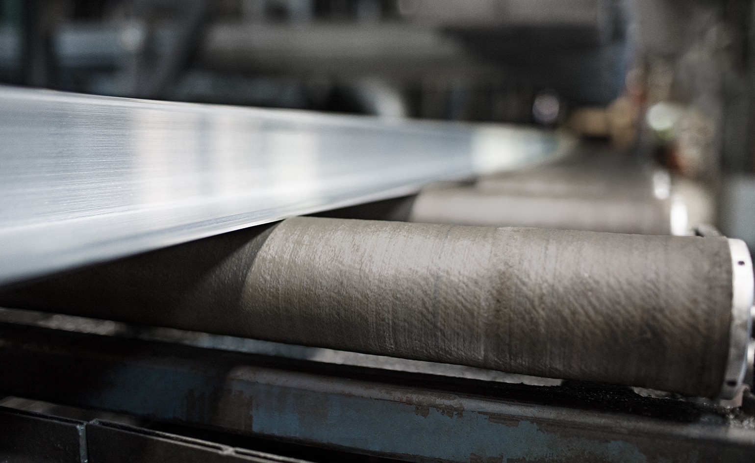 Extruded profile exiting the extrusion press