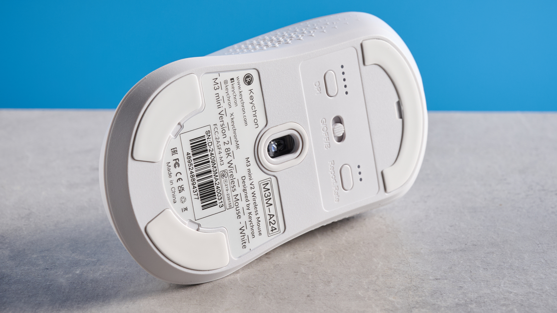 A white Keychron M3 Mini 8K gaming mouse