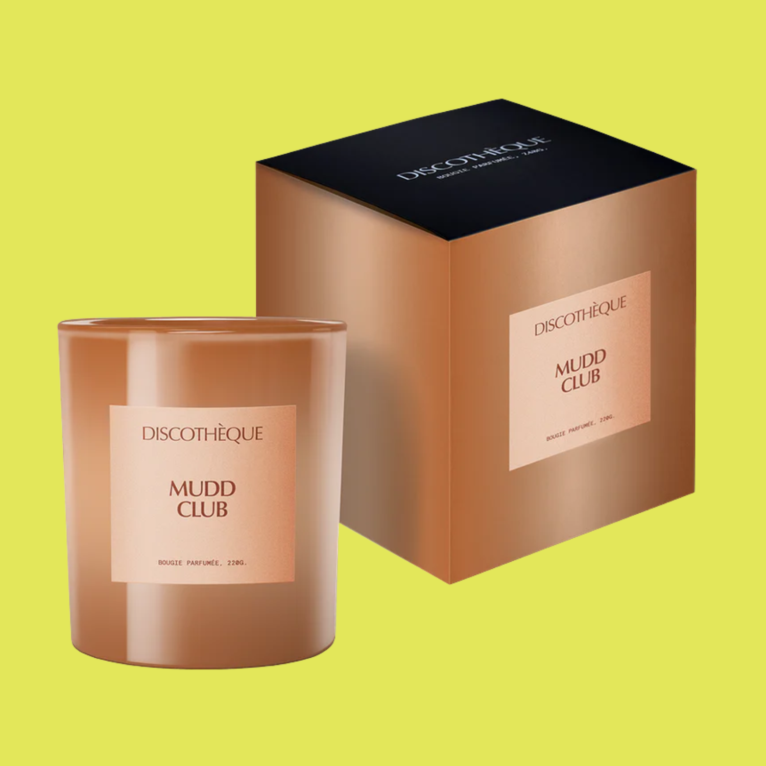 A brown candle beside a box